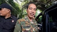 Jokowi Ikut Parade Senja Berseragam Komcad